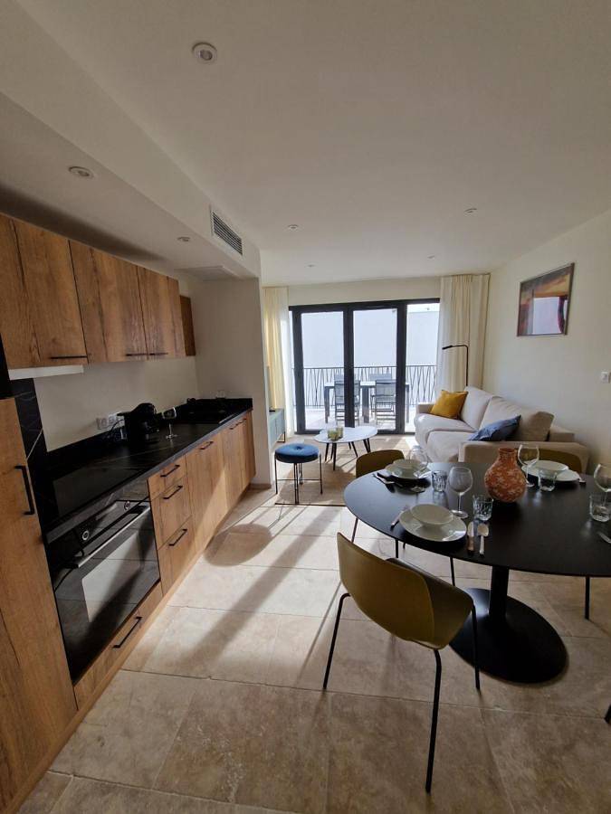 Appartement de vacances pour 3 personnes, avec Terrasse et Jardin ainsi que Bassin pour enfant et Piscine