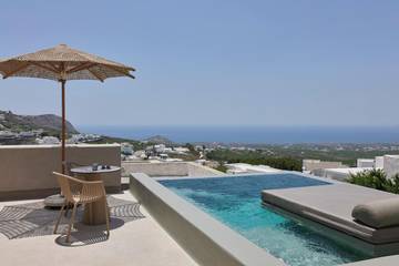 Chambre d’hôte pour 2 personnes, avec balcon ainsi que vue et piscine à Santorin
