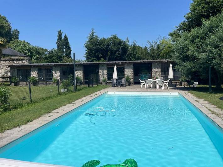 Location de vacances pour 4 personnes, avec Terrasse et Jardin ainsi que Piscine et Vue à Assat