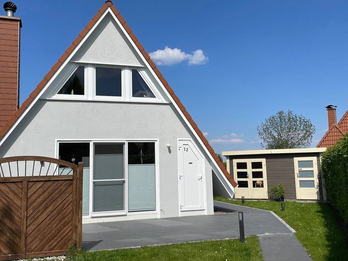 Ferienhaus mit Meerblick für 4 Personen, mit Garten