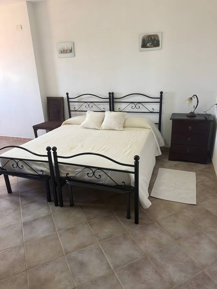 Room 'Tripla Standard 1' with Shared Terrace, Wi-Fi and Air Conditioning in Nulvi, Sassari Province