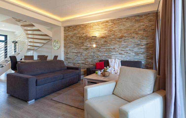 Geheel vakantieappartement, Bliss aan het strand - Modern appartement met terras & TV (500m van Strand Binz) in Strand Prora, Binz