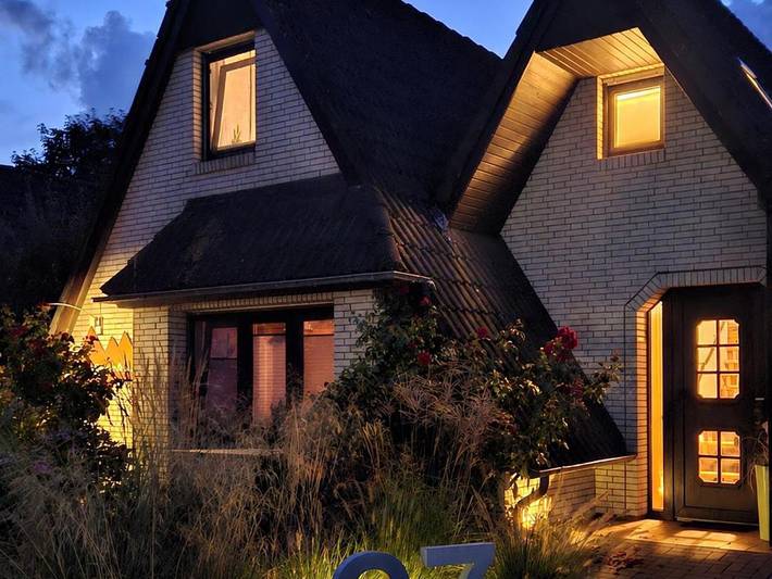 Ferienwohnung für 3 Personen, mit Terrasse und Garten sowie Sauna und Ausblick