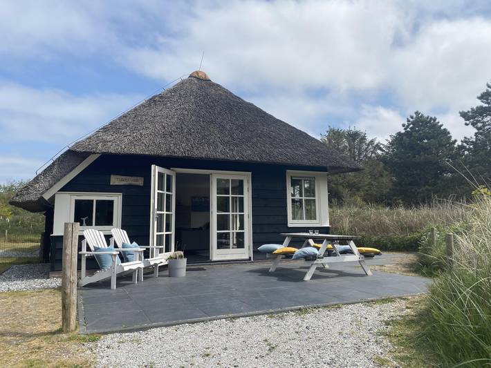 Vakantiehuis voor 8 personen, with Balkon/Terras and Terras as well as Tuin and Sauna op Ameland