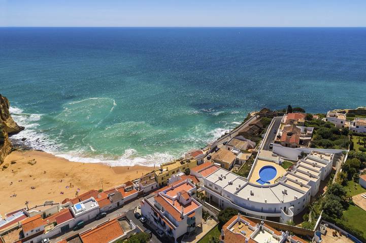 Ferienhaus mit Meerblick für 4 Personen, mit Kinderpool und Balkon sowie Pool und Meerblick