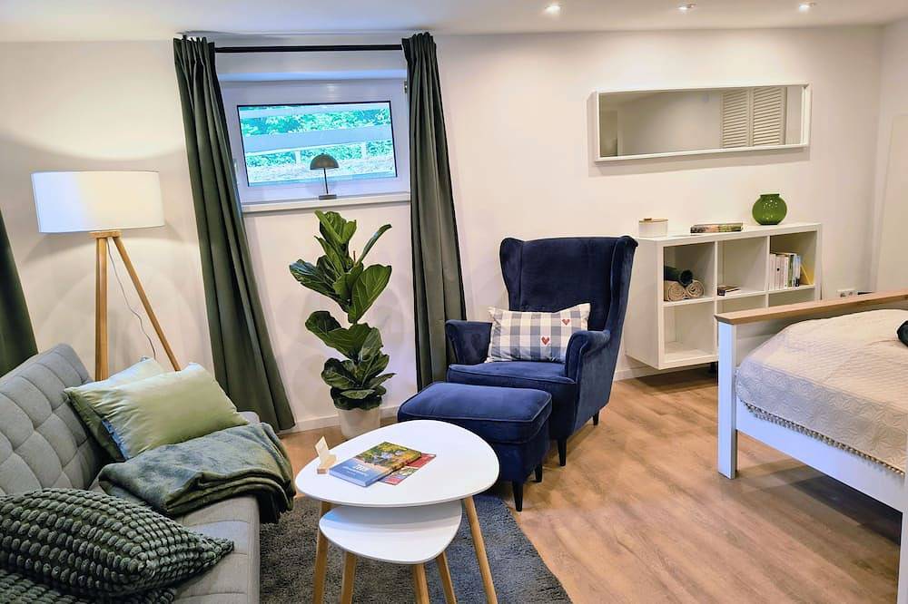 Ganze Wohnung, Perfekt für Wintertage im Harz- moderne Ferienwohnung mit Vollküche am Rodelhang in Osterode, Harzvorland