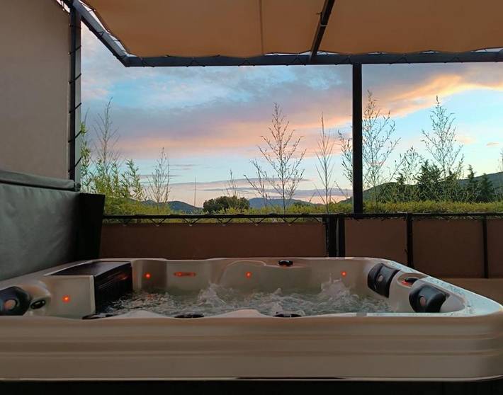Appartement de vacances pour 4 personnes, avec Jacuzzi ainsi que Terrasse et Vue