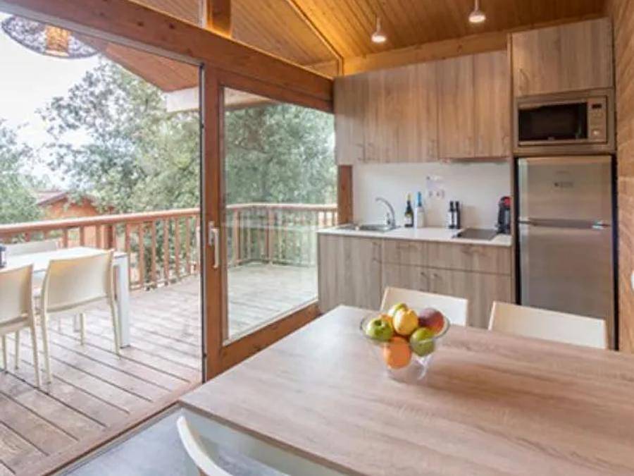 Camping Sea Green Cala Llevado  - Chalet 5 persons - Privilege 2 bedrooms in Santa Maria de Llorell, Tossa de Mar