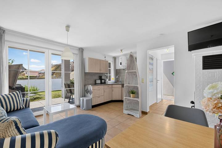 Ferienhaus für 4 Personen, mit Terrasse und Garten sowie Seeblick in Loddin