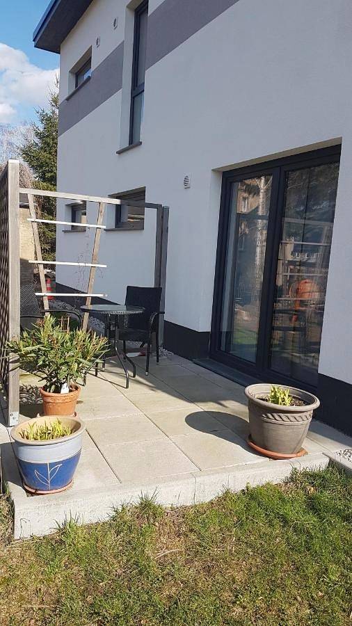 Ferienwohnung für 4 Personen, mit Terrasse und Garten sowie Pool und Sauna in Niederwiesa