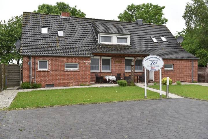 Ferienwohnung für 2 Personen, mit Ausblick und Garten, kinderfreundlich in Eilsum