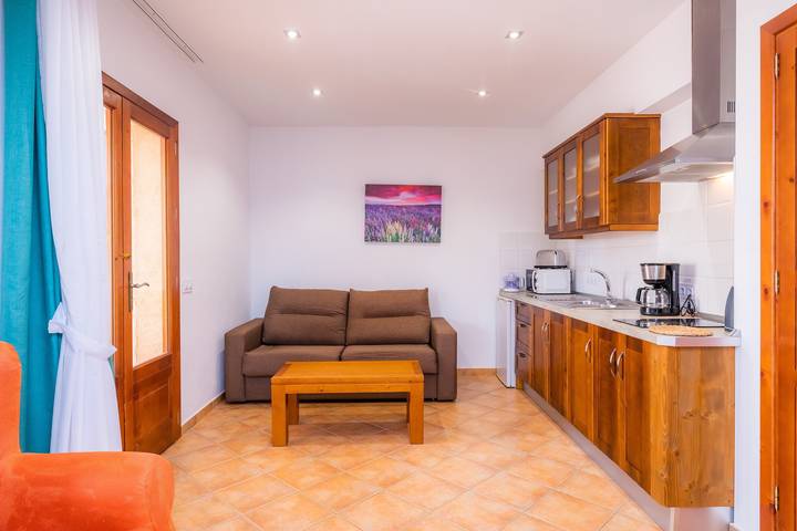 Apartamento inteiro, Apartamento 'S Hort Can Capità Familiar Terraza 4' perto do Mar com Piscina Partilhada & Wi-Fi in Ariany, Maiorca Centro