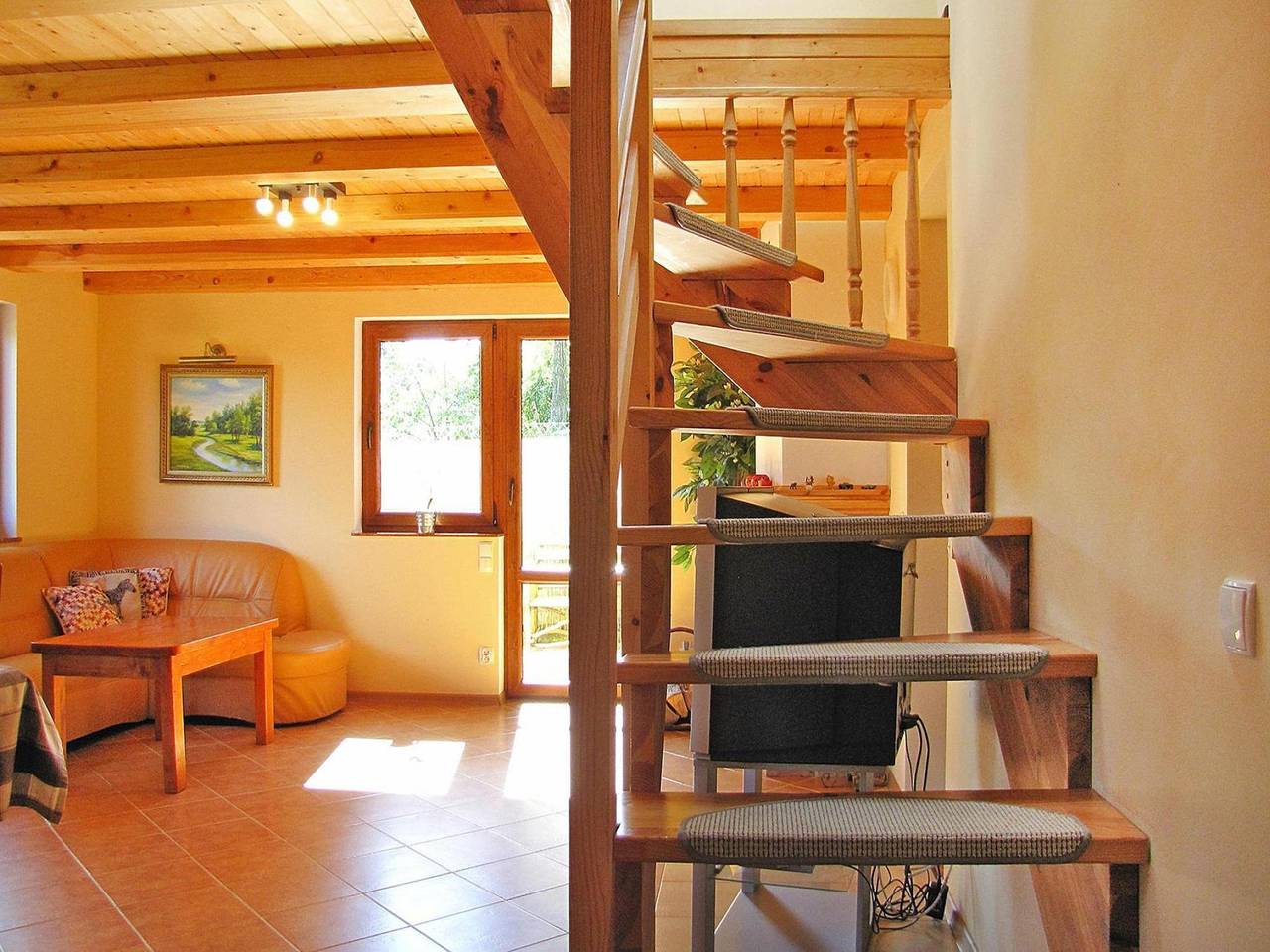 Ferienhaus am Wilkasy-See mit Ruderboot in Löwentinsee