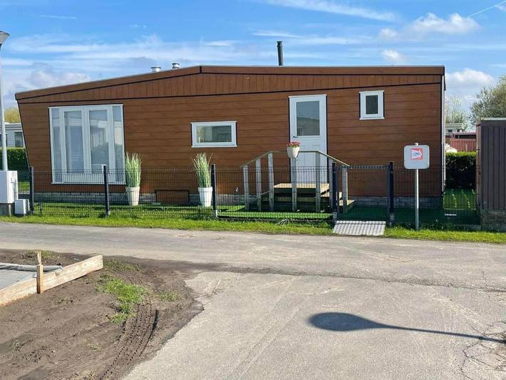 Camping für 4 Personen, mit Terrasse und Garten sowie Pool und Ausblick in De Haan