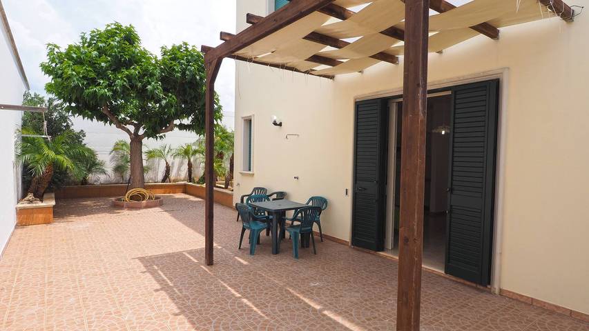 Appartamento per 7 persone, con balcone e giardino, con animali domestici a Torre Suda