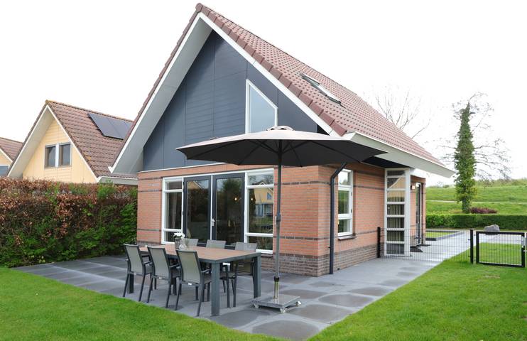 Ferienhaus für 6 Personen, mit Balkon/Terrasse und Terrasse sowie Garten