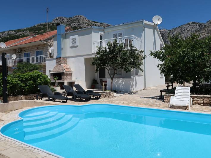 Ferienhaus für 8 Personen, mit Balkon und Terrasse sowie Garten