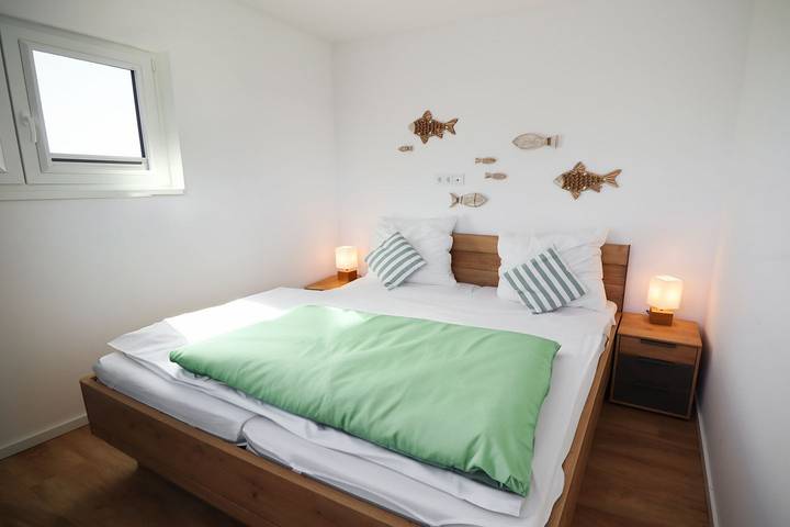 Ferienhaus für 4 Personen, mit Ausblick und Garten sowie Sauna in Butjadingen - 2