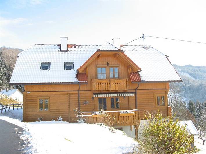Ferienhaus für 4 Personen, mit Balkon und Garten