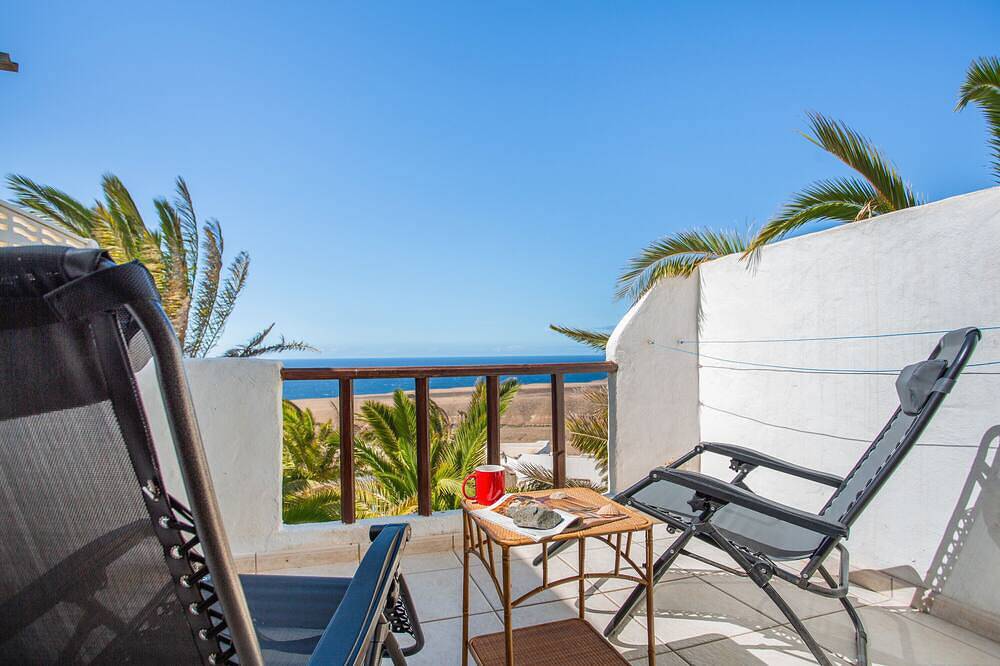 Apartamento entero, Apartamento vacacional 'Sonneninsel Fuerteventura' con vistas al mar, piscina comunitaria y wifi in Playa Valle de Santa Inés, Betancuria