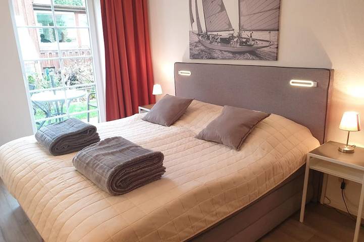 Ferienwohnung für 2 Personen, mit Terrasse und Garten sowie Pool und Sauna in Laboe