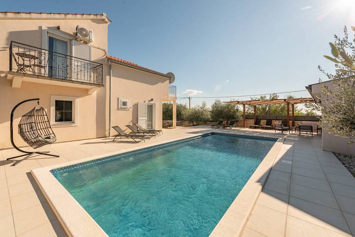 Ferienhaus für 8 Personen, mit Garten