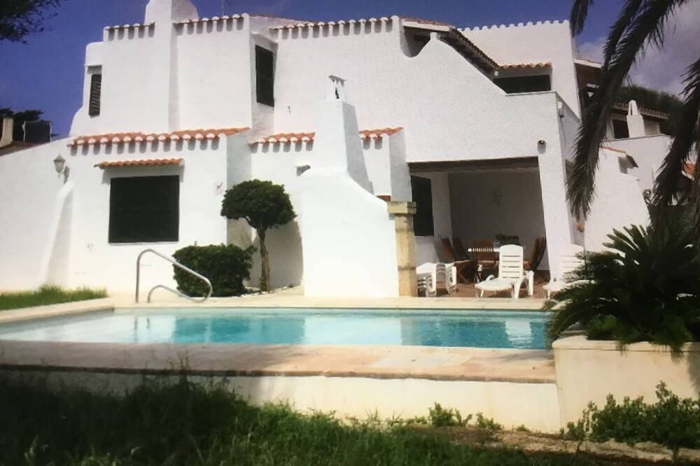 House with pool near the beach and marina in Cala en Bosc, Ciutadella
