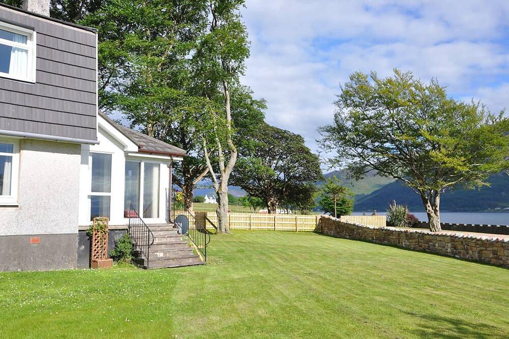 Lochside with beach access uninterrupted views of spectacular Highland Mountains in Highlands