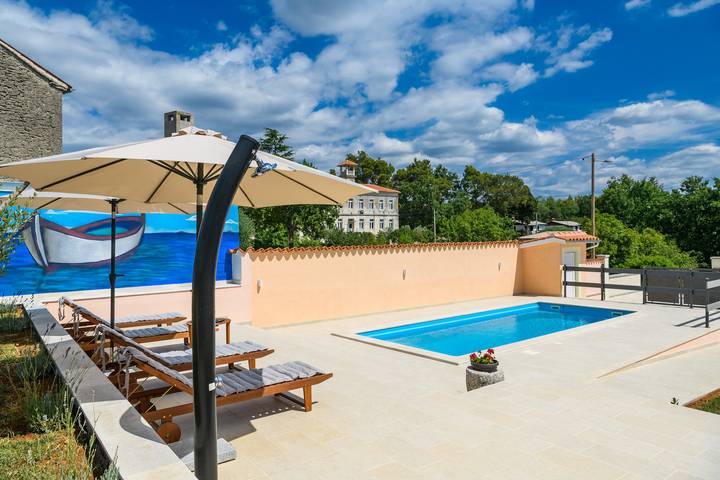 Ferienhaus für 4 Personen, mit Terrasse und Garten sowie Pool in Divšići