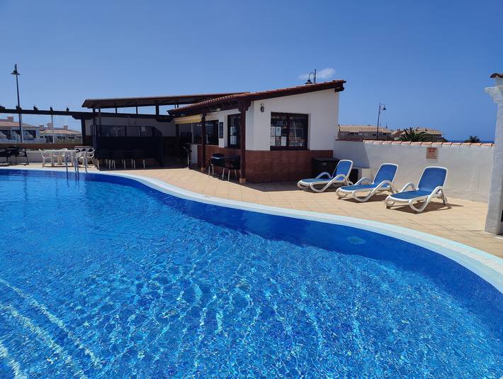 Apartamento para 4 personas, con jardín además de vistas al mar y piscina, Familias con niños en Amarilla Golf