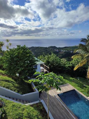 Maison d’hôte pour 2 personnes, avec piscine et terrasse ainsi que jardin et vue dans DOM-TOM