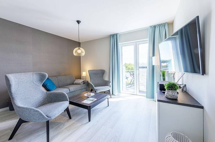 Ferienwohnung für 4 Personen, mit Balkon und Sauna sowie Seeblick