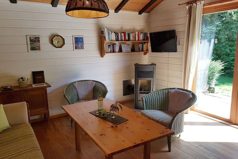 Gemütliches Blockhaus auf historischem Dreiseithof - Ferienhaus Ströh in Steinberg, Schleswig-Flensburg