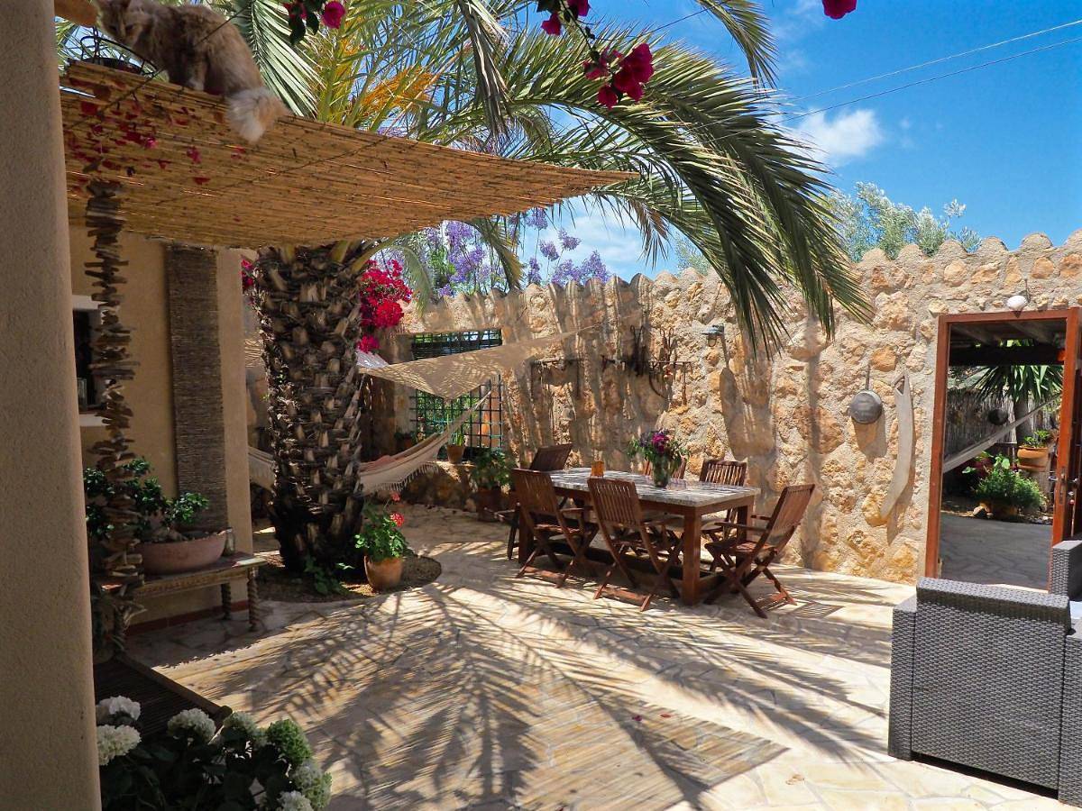 Apartamento vacacional entero, Tinyhouse im Patio einer romantischen Finca in Cuevas del Almanzora, Costa de Almería