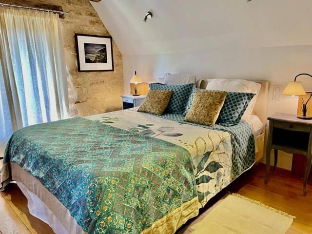 Location de vacances pour 2 personnes, avec Terrasse et Jardin ainsi que Piscine et Vue à Saint-Cybranet
