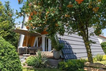 Ferienhaus für 6 Personen, mit Balkon und Garten sowie Sauna, mit Haustier in Kröslin