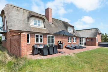 Ferienhaus mit Meerblick für 8 Personen, mit Whirlpool und Terrasse sowie Sauna, mit Haustier in Blavand