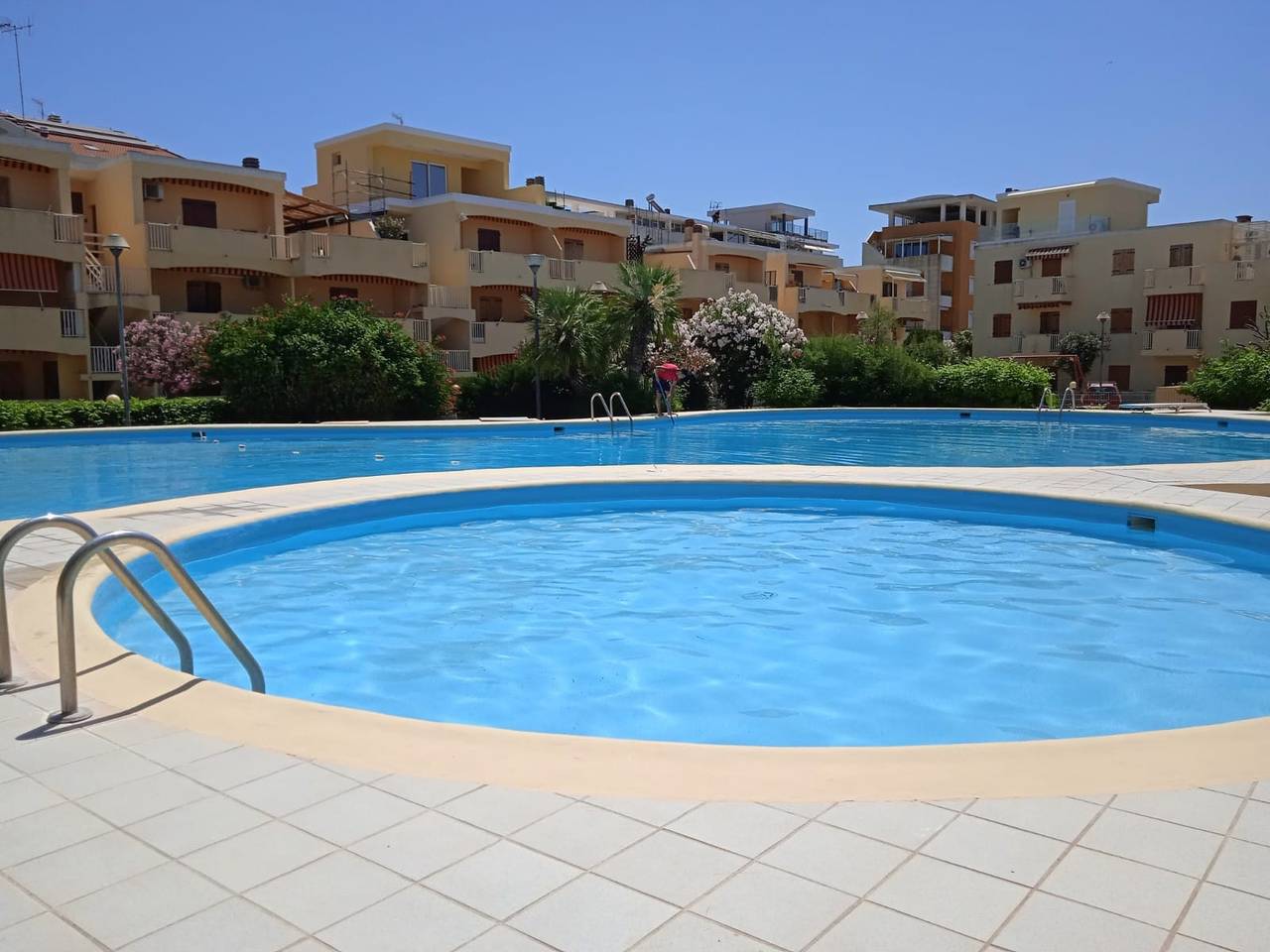 Apartamento entero, Appartamento Eucaliptus cerca de la playa con vistas al mar, piscina, aire acondicionado y jardín in La Pietraia, Alguer