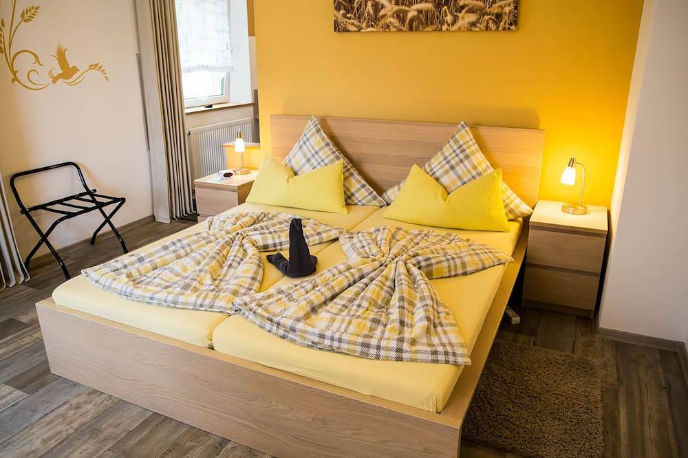 Ganze Wohnung, Weizenzimmer - Modern eingerichtetes Apartment Nähe Musikhaus Thomann in Burgebrach, Steigerwald