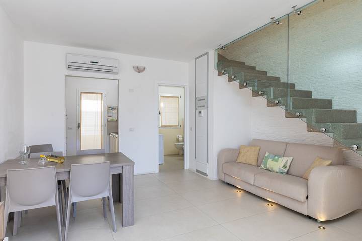 Appartamento intero, Appartamento "Residenza Cormorani 2" vicino alla spiaggia con vista mare, Wi-Fi e terrazza in Terza Spiaggia, Golfo Aranci