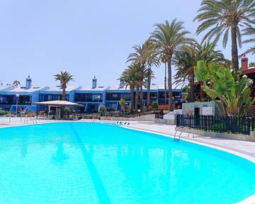 Ferienwohnung für 4 Personen, mit Ausblick und Garten sowie Pool in Playa del Águila