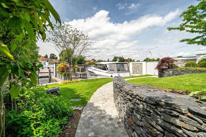 Appartement entier, Appartement « Garten Room » avec vue sur le lac, terrasse commune et Wi-Fi in Malchow, Fleesensee