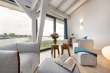 Ferienhaus für 4 Personen, mit Balkon und Sauna in Ummanz