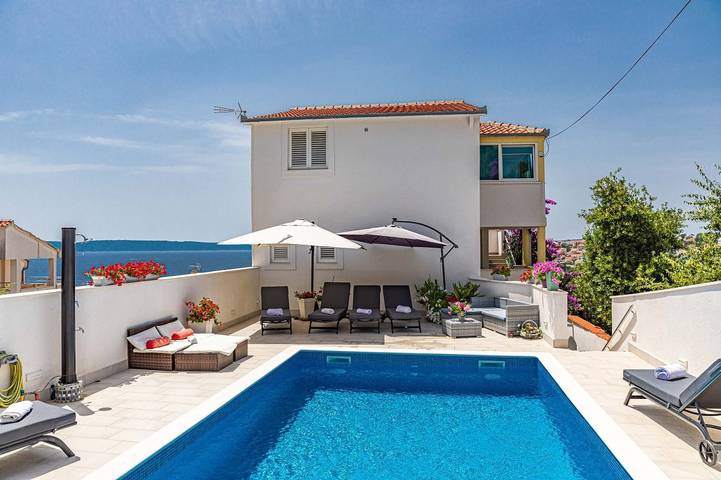 Appartement de vacances pour 4 personnes, avec piscine et terrasse