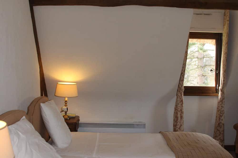 Casa a 6 minutos de Deauville - jardín cerrado, excelentes servicios de hotel. in Touques, Region de Lisieux