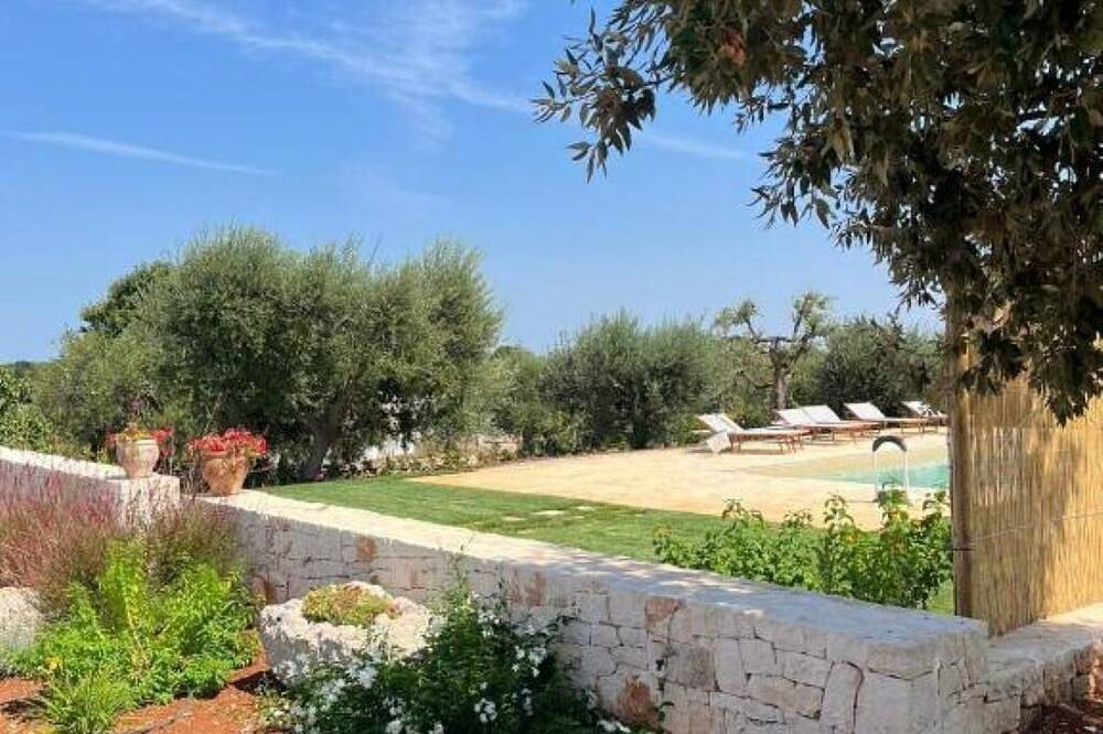 Domus Petri 1908 Melograno - Trulli con piscina in Valle d'Itria in Cisternino, Salento