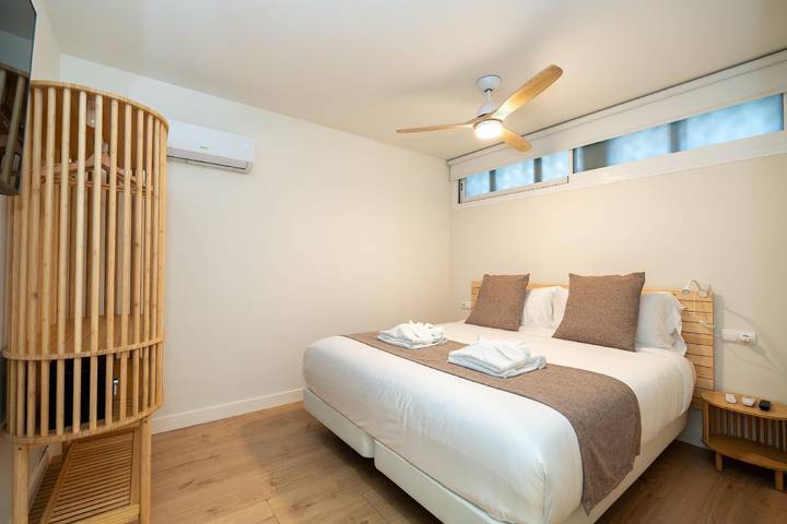 Appartement de vacances pour 4 personnes, avec jardin ainsi que piscine et balcon