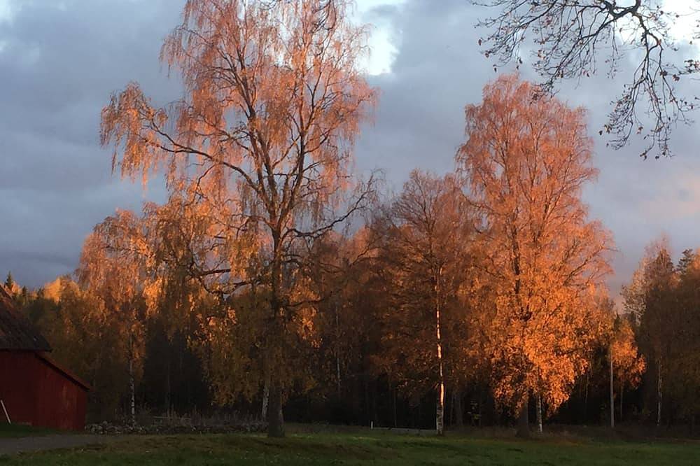 Nice farm apartment with terrace and garden right next to forest and river. in Kronoberg