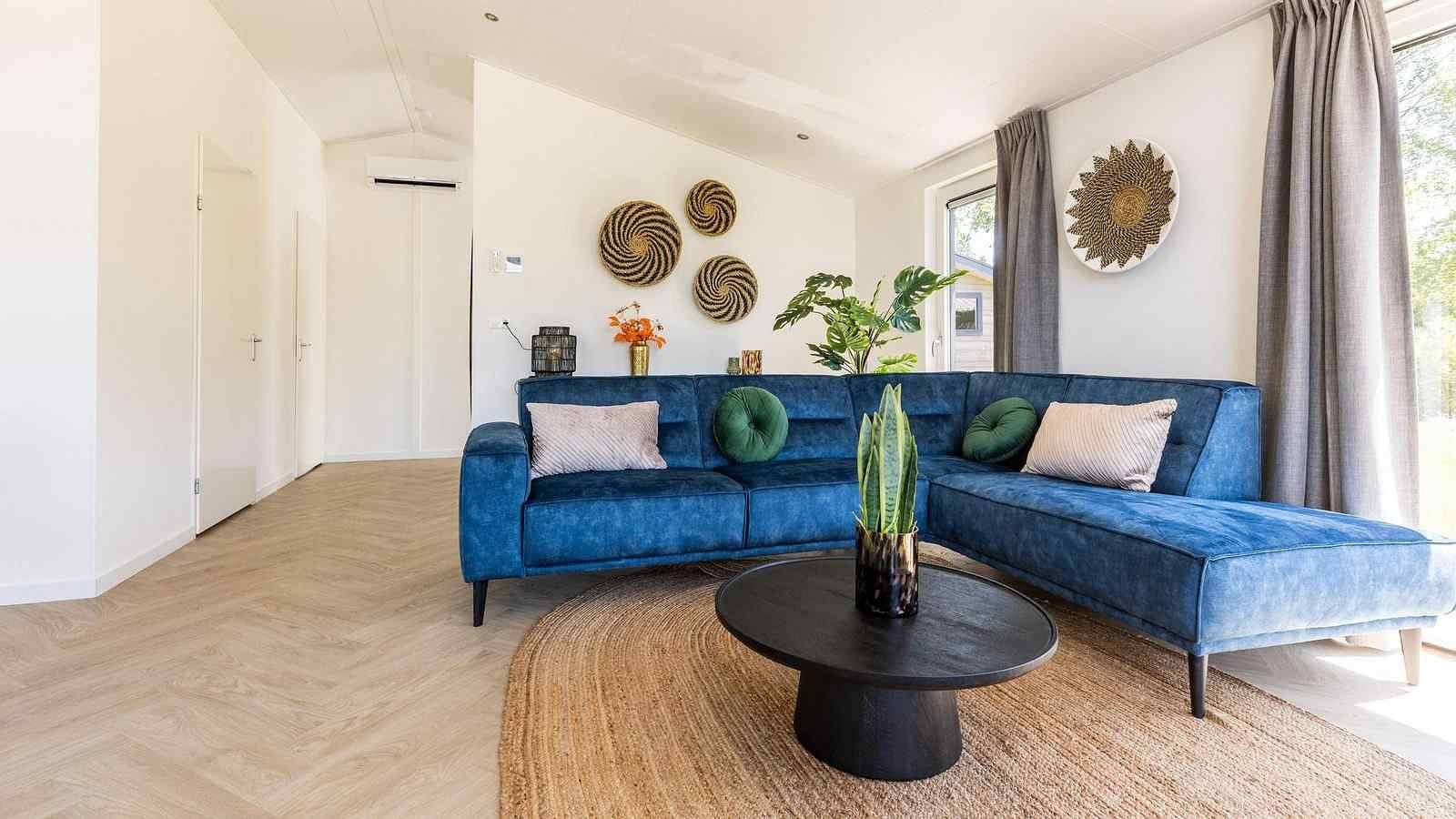 4-person lodge on the waterfront on holiday park Molenvelden in Veldhoven in Veldhoven, North Brabant