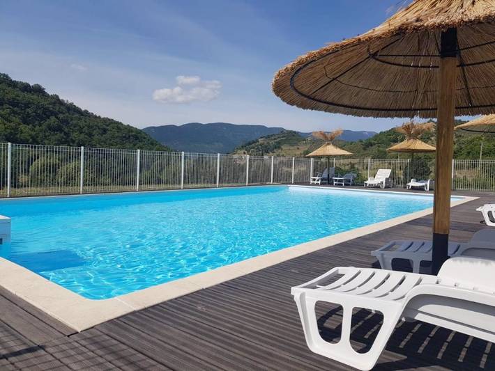 Appartement de vacances pour 8 personnes, avec Terrasse ainsi que Piscine et Vue